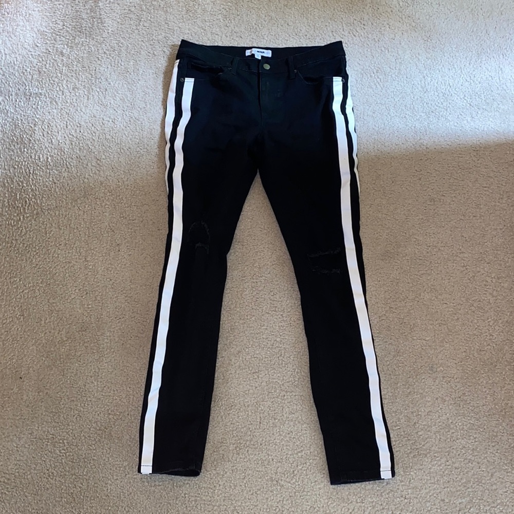 Black Fashion Nova Jeans with white stripes.